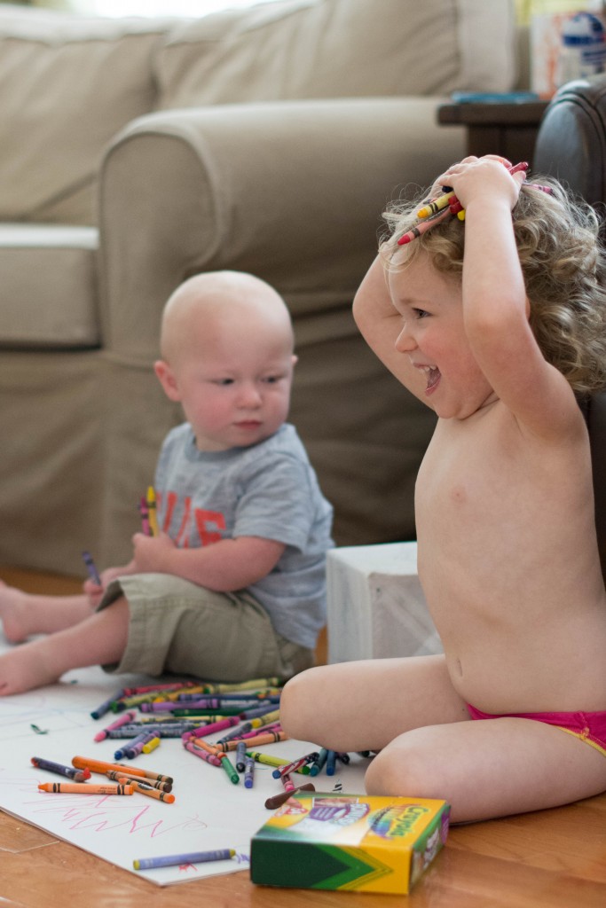 This is the "Mom, I am really not listening to you" look." Crayons on the head...not OK. She ended up in timeout after this. And had to get dressed.