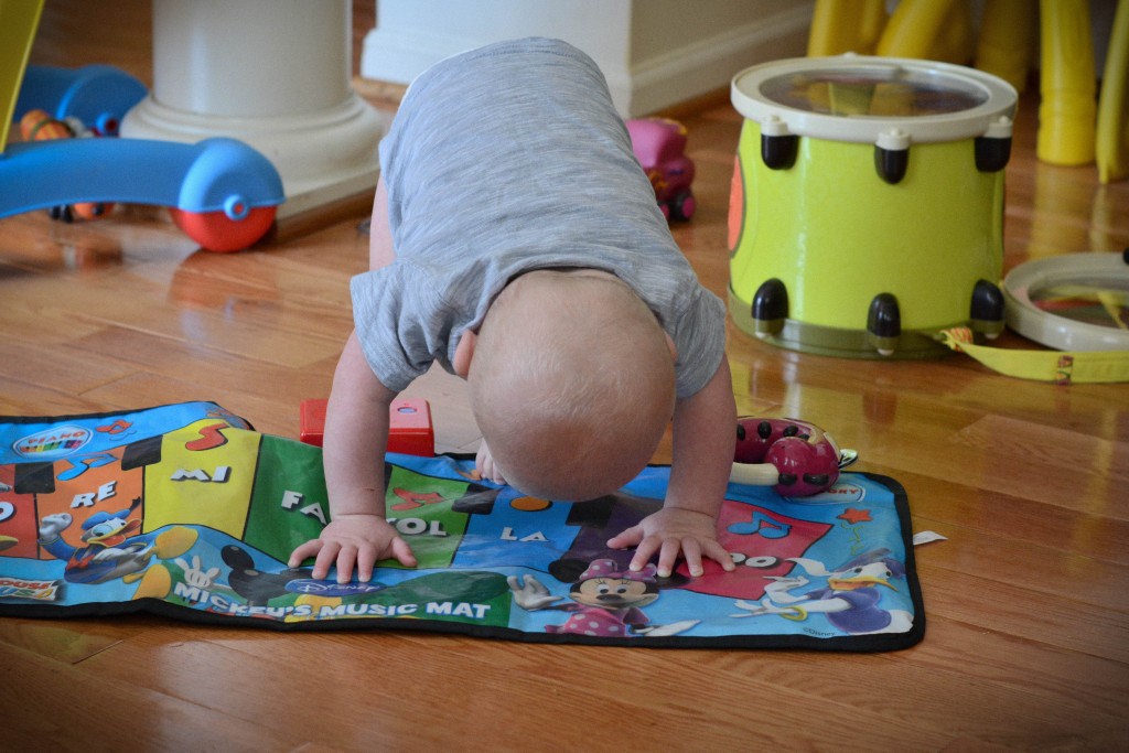 Liam also likes to try and do somersaults lately. He needs help going over, but chances are you'll see him doing this a few times each day.