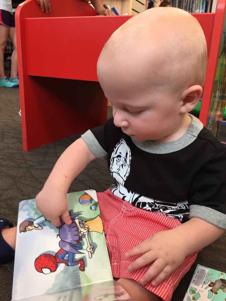 Library time...today we read books about dads. It was 85+ in the Children's library so we didn't stay long. Liam was crabby and tired BEFORE we got there.