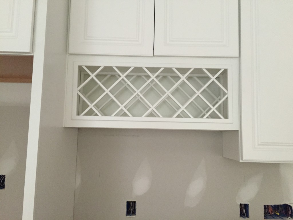 And the wine rack rack above the kitchen desk. 13 bottles. Better start saving for those! :)
